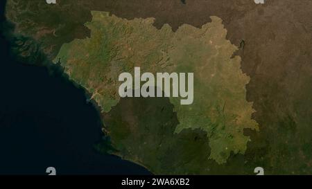 Guinea evidenziata su una mappa satellitare a bassa risoluzione Foto Stock