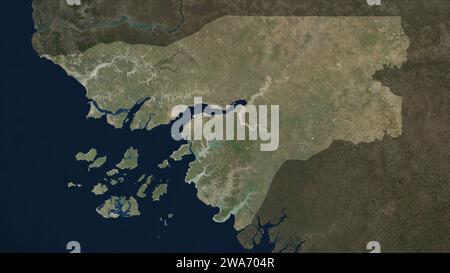 Guinea-Bissau evidenziata su una mappa satellitare a bassa risoluzione Foto Stock