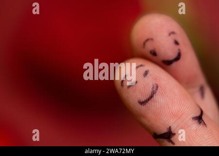 concetto di amore con le dita che abbracciano Foto Stock
