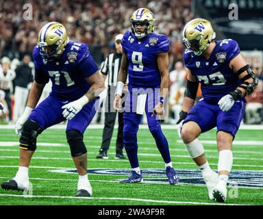 01 gennaio 2024 New Orleans LA U.S.A. Washington quarterback Michael Penix Jr. (9) inizia la partita durante la partita di football semifinale NCAA Allstate Sugar Bowl tra Washington Huskies e i Texas Longhorns. Washington batté il Texas 37-31 al Caesars Superdome di New Orleans, LA Thurman James/CSM Foto Stock