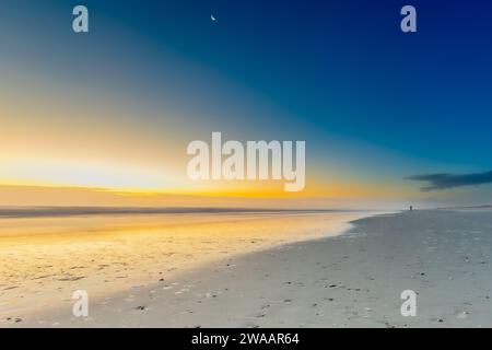 Luna all'alba, Saint Augustine Beach Foto Stock