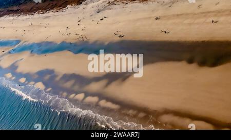 Camminando a Low Tide, Coligny Beach Foto Stock