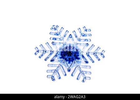 Fiocco di neve in plastica blu con LED Foto Stock