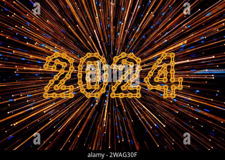 Le luci seguono tecniche di zoom con 2024 Happy New Year realizzati con maglie a catena, deformazione delle stelle, effetto dello zoom avanti e indietro della fotocamera mentre si fa Foto Stock