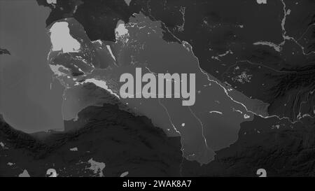 Turkmenistan evidenziato su una mappa di elevazione in scala di grigi con laghi e fiumi Foto Stock