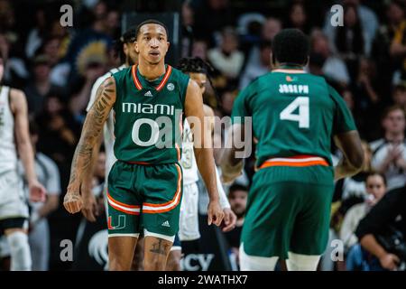 Winston-Salem, NC, USA. 6 gennaio 2024. La guardia degli Hurricanes di Miami (FL) Matthew Cleveland (0) festeggia dopo aver segnato contro la Wake Forest nella partita di basket ACC al LJVM Coliseum di Winston-Salem, NC. (Scott Kinser/CSM). Credito: csm/Alamy Live News Foto Stock