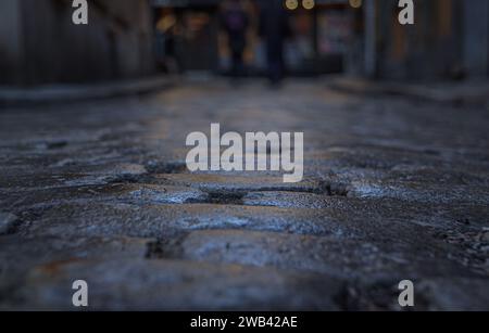 primo piano delle strade acciottolate della città Foto Stock