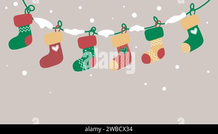 Accessori invernali. Calze di Natale su una ghirlanda Illustrazione Vettoriale