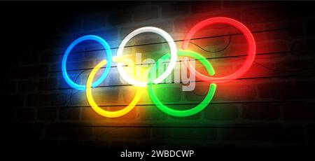 Poznan, Polonia, 7 gennaio 2024: Anelli olimpici simbolo al neon. Lampadine colorate per insegne dei Giochi Olimpici internazionali. Illustrazione 3d del concetto astratto. Foto Stock