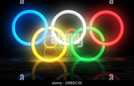 Poznan, Polonia, 7 gennaio 2024: Anelli olimpici simbolo al neon. Lampadine colorate per insegne dei Giochi Olimpici internazionali. Illustrazione 3d del concetto astratto. Foto Stock