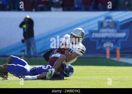 Frisco, Stati Uniti. 7 gennaio 2024. Frisco, Texas, Stati Uniti: Un giocatore del Montana viene placcato durante la gara di campionato NCAA Division i FCS del 2024 tra i Montana Grizzlies e i South Dakota State Jackrabbits giocata al Toyota Stadium domenica 7 gennaio 2024 a Frisco, Stati Uniti. (Foto di Javier Vicencio/Eyepix Group/Sipa USA) credito: SIPA USA/Alamy Live News Foto Stock