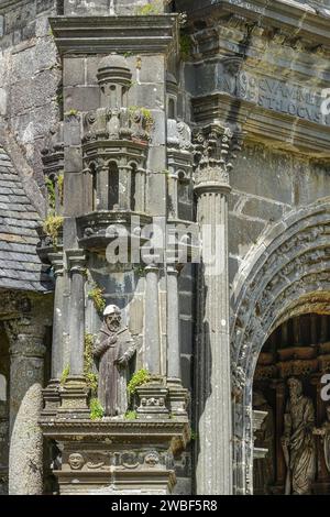 Side portal of the church, Enclos Paroissial parish of Guimiliau, Finistere Penn ar Bed department, Brittany Breizh region, France Stock Photo