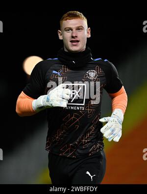 Blackpool, Regno Unito. 10 gennaio 2024. Mackenzie Chapman di Blackpool si riscalda prima della partita, durante il Bristol Street Motors Trophy Match Blackpool vs Burton Albion a Bloomfield Road, Blackpool, Regno Unito, il 10 gennaio 2024 (foto di Cody Froggatt/News Images) a Blackpool, Regno Unito il 1/10/2024. (Foto di Cody Froggatt/News Images/Sipa USA) credito: SIPA USA/Alamy Live News Foto Stock