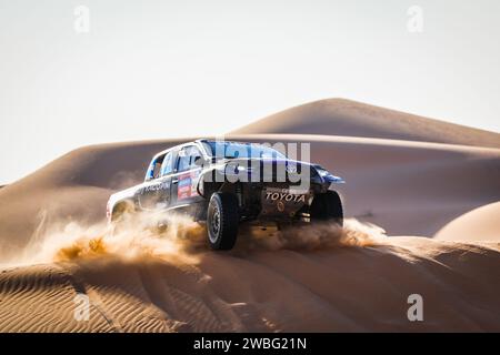 205 YACOPINI Juan Cruz (arg), OLIVERAS CARRERAS Daniel (spa), Overdrive Racing, Toyota Hilux, FIA Ultimate, FIA W2RC, azione durante la quinta fase della Dakar 2024 il 10 gennaio 2024 tra al-Hofuf e Subaytah, Arabia Saudita - foto Frédéric le Floc'h/DPPI Credit: DPPI Media/Alamy Live News Foto Stock