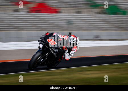 Pilota italiano di MotoGP nr. 49 Fabio di Giannantonio si allena ai test 2024 con Ducati Mooney VR46 Racing Team sul circuito di Valencia, Spagna Foto Stock