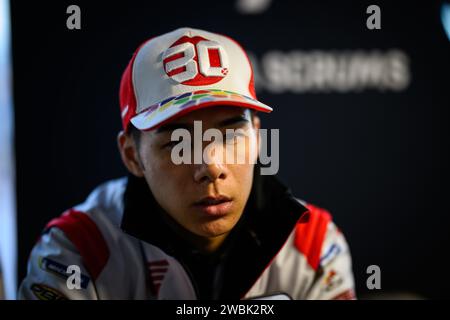 Ritratto del pilota giapponese di MotoGP del team LCR Honda Takaaki Nakagami conferenza stampa post gara del Gran Premio Motul di Valencia, Spagna. Foto Stock