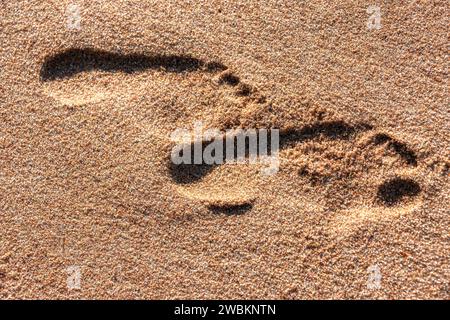 Passi nella sabbia sulla spiaggia, sulla Ballito Bay, Durban Foto Stock