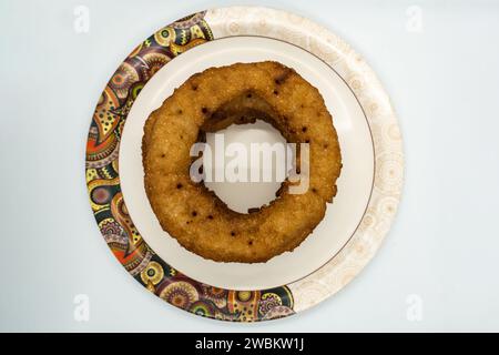 Nepali Sel Roti a base di farina di riso, grano e zucchero. Speciale festival del pane Dashain Tihar Foto Stock