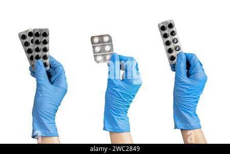 Pillole per tenere le mani, farmaci, medicine, compresse, carbone in blister, isolato su bianco Foto Stock