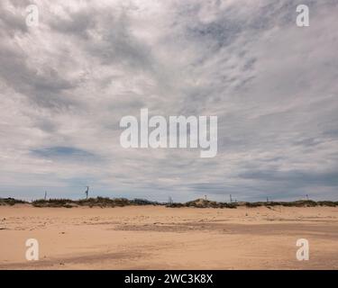 Giornata nuvolosa alla spiaggia Dune du Sud, Isole Magdalen, Quebec, Canada Foto Stock