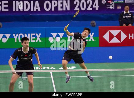 Nuova Delhi, India. 16 gennaio 2024. Huang Dong Ping (R) e Feng Yan Zhe della Cina competono nel doppio misto contro Dejan Ferdinansyah e Gloria Emanuelle Widjaja dell'Indonesia al torneo di badminton India Open 2024 a nuova Delhi, India, 16 gennaio 2024. Crediti: Javed Dar/Xinhua/Alamy Live News Foto Stock