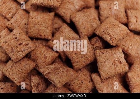 Concetto della colazione - sottofondo di cuscini di cioccolato o vaniglia Foto Stock