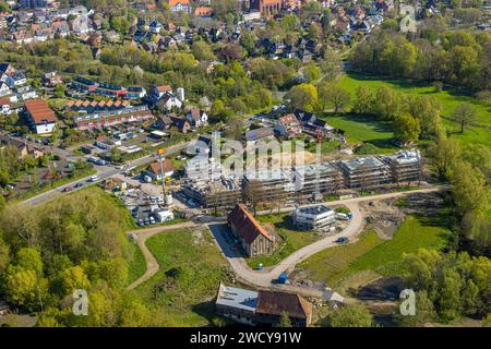 Vista aerea, Schlossmühle am Mühlengraben e Mühlenteich con cantiere e nuovo edificio, distretto di Heessen, Hamm, area della Ruhr, Reno settentrionale-occidentale Foto Stock