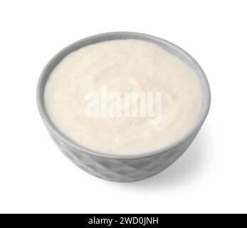 Delizioso budino di semola in un recipiente isolato su bianco Foto Stock