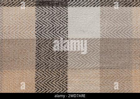 Immagine di sfondo - texture in tessuto a quadri in tonalità beige. Foto Stock