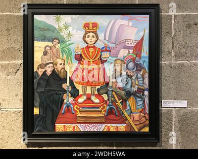 Manila, Filippine. 21 gennaio 2024: Pittura nella chiesa e monastero di San Agustin a Intramuros, il quartiere più antico delle mura. La festa di sto. Nino de tondo (Lakbayaw) e Santo Nino de Pandacan sono celebrati nelle due parrocchie di Manila ogni terza domenica di gennaio. Oggi, i devoti porteranno le loro statue o immagini del bambino Gesù e si uniranno a una processione in onore del Santo bambino. La devozione, anch'essa un grande evento a Cebu (Sinulog), ebbe origine più di 500 anni fa, quando Magellano sbarcò nell'arcipelago nel 1519 e portò un'immagine del bambino Gesù Cristo. Crediti: Kevin Izorce/Alamy Live News Foto Stock