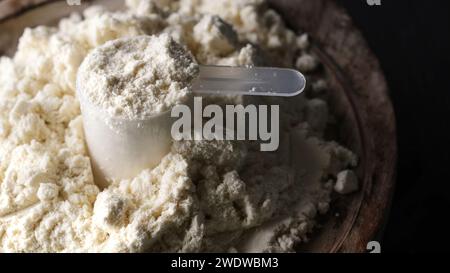 Misurino riempito con siero di latte proteico secco Foto Stock