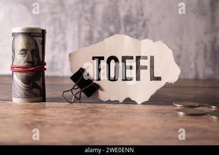 TOEFL, testo tipografia scritto su carta, lingua inglese concetto educativo. Foto Stock