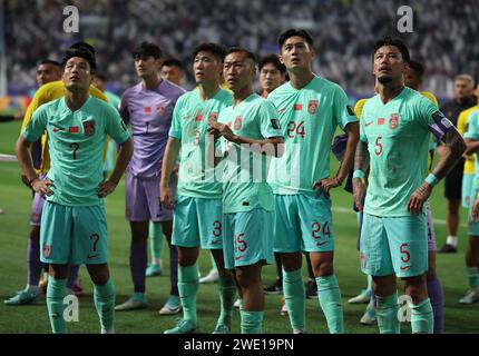 Doha, Qatar. 22 gennaio 2024. I giocatori cinesi reagiscono dopo la partita del gruppo A tra Qatar e Cina della Coppa d'Asia dell'AFC allo Stadio internazionale di Khalifa a Doha, in Qatar, il 22 gennaio 2024. Crediti: Jia Haocheng/Xinhua/Alamy Live News Foto Stock