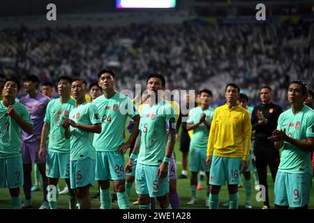 Doha, Qatar. 22 gennaio 2024. I giocatori cinesi reagiscono dopo la partita del gruppo A tra Qatar e Cina della Coppa d'Asia dell'AFC allo Stadio internazionale di Khalifa a Doha, in Qatar, il 22 gennaio 2024. Crediti: Jia Haocheng/Xinhua/Alamy Live News Foto Stock