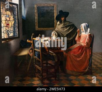 Pittura di Johannes Vermeer; "il bicchiere di vino"; o "il bicchiere di vino" 1659; pittura olandese del secolo d'oro di una donna e seduzione. Delft School, Foto Stock