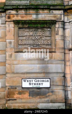 Tower Buildings sculture in pietra in West George Street, Glasgow, Scozia, Regno Unito, Europa Foto Stock