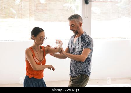 Istruttori Taiji che seguono la loro routine di allenamento Foto Stock