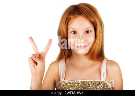 Foto studio di adorabile piccola rossa di 9 - 10 anni Foto Stock