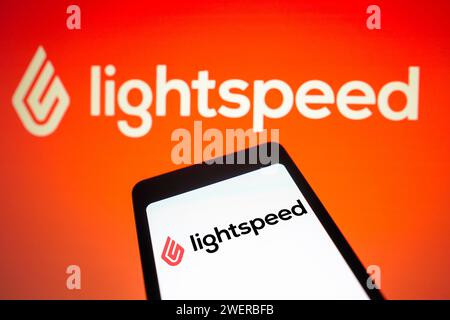 Brasile. 26 gennaio 2024. In questa immagine, il logo LightSpeed Commerce viene visualizzato sullo schermo di uno smartphone e sullo sfondo. (Immagine di credito: © Rafael Henrique/SOPA Images via ZUMA Press Wire) SOLO USO EDITORIALE! Non per USO commerciale! Foto Stock