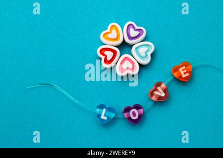 Amore, perline colorate per creare collane e braccialetti Foto Stock