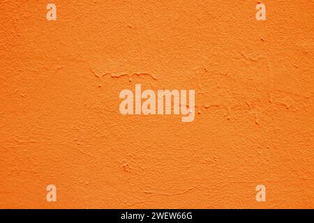 Intonaco arancione sulla parete. Foto Stock