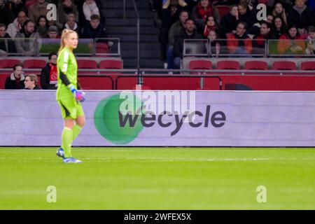 Amsterdam Duivendrecht, Paesi Bassi. 30 gennaio 2024. AMSTERDAM-DUIVENDRECHT, PAESI BASSI - GENNAIO 30: Banner commerciale WeCycle durante la UEFA Women's Champions League - gruppo C partita tra AFC Ajax e AS Roma allo Sportpark De Toekomst il 30 gennaio 2024 ad Amsterdam-Duivendrecht, Paesi Bassi. (Foto di Jan Mulder/Orange Pictures) credito: Orange Pics BV/Alamy Live News Foto Stock