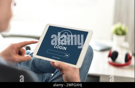 Schermo del tablet che visualizza un concetto di accesso Foto Stock