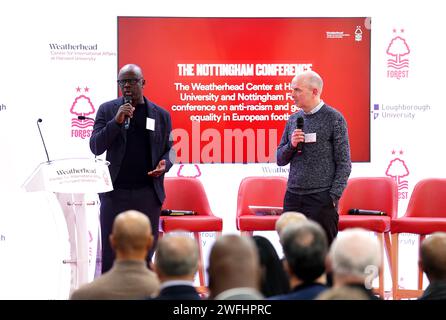 L'ex calciatore Lilian Thuram (a sinistra) durante la Racial and Gender Equity nella European Football Conference al City Ground di Nottingham. La conferenza, volta ad affrontare le questioni del razzismo e della disuguaglianza di genere nel calcio europeo, è sostenuta dal proprietario forestale Evangelos Marinakis. Data foto: Mercoledì 31 gennaio 2024. Foto Stock