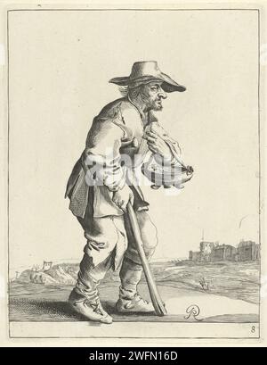 Mendicante con un vaso con carbone infuocato, Pieter Jansz Quast, 1634 - 1638 stampa Un mendicante corre di supporto sul suo bastone a destra. Indossa una pentola con il carbone che stringe intorno al braccio sinistro. Sullo sfondo rovine e forcelle. La stampa fa parte di una serie di ventisei stampe con mendicanti e contadini. L'Aia incisione/incisione di carta mendicante. ci si riscalda davanti a un fuoco (o focolare, fornello, padella del fuoco, braciere) Foto Stock