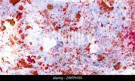 Sfondo texture astratta. Gocce rosse e macchie di varie dimensioni, talvolta verdi. Disseminata caoticamente su sfondo blu e bianco. I colori si mescolano Foto Stock