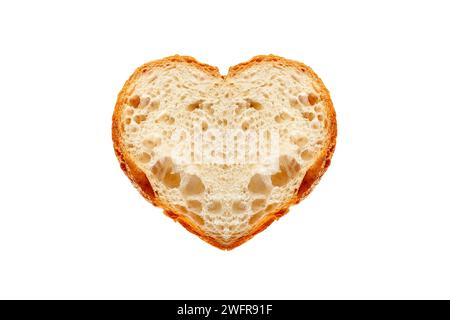 Vista dall'alto pezzo di pane tagliato a forma di cuore isolato su sfondo bianco, concetto di panetteria fatta in casa Foto Stock