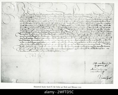 Nella foto c'è la lettera di condotta sicura del Kaiser Carlo i per Martin Lutero per il suo viaggio a Worms nel 1521. La dieta di Worms del 1521, guidata dall'imperatore Carlo V, passò l'editto di Worms, il che bandì gli scritti di Lutero e lo dichiarò eretico e nemico dello Stato. Anche se l'editto imponeva che Lutero fosse catturato e consegnato all'imperatore, non fu mai applicato. Foto Stock