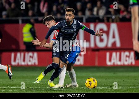 Girona, Spagna. 3 febbraio 2024. Miguel Gutiérrez (L) di Girona F.C e Brais Méndez (R) della Real Sociedad visti in azione durante la partita LaLiga EA Sports round 23 tra Girona F.C e Real Sociedad ad Estadi Montilivi. Punteggio finale; Girona F.C 0 - 0 Real Sociedad. (Foto di Martì Segura Ramoneda/SOPA Images/Sipa USA) credito: SIPA USA/Alamy Live News Foto Stock