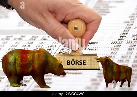 Bull and Bear su una lista con azioni, francobolli, borsa valori Foto Stock